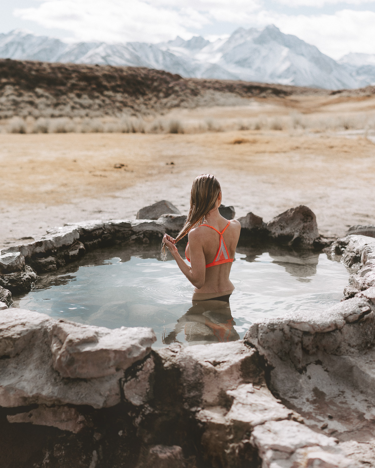 Girl in hot springs Mammoth Mountain Eastern Sierra